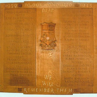 commemoration plaque for 34 current and former students that were killed in action